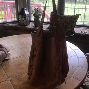 Brown shoulder bag with cute tassels